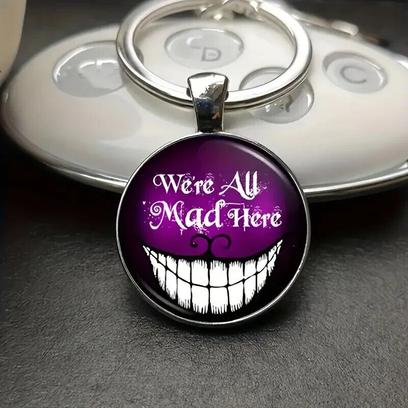 ALICE Grinning Cheshire Cat Keychain Gift We're All MAD Here Purple